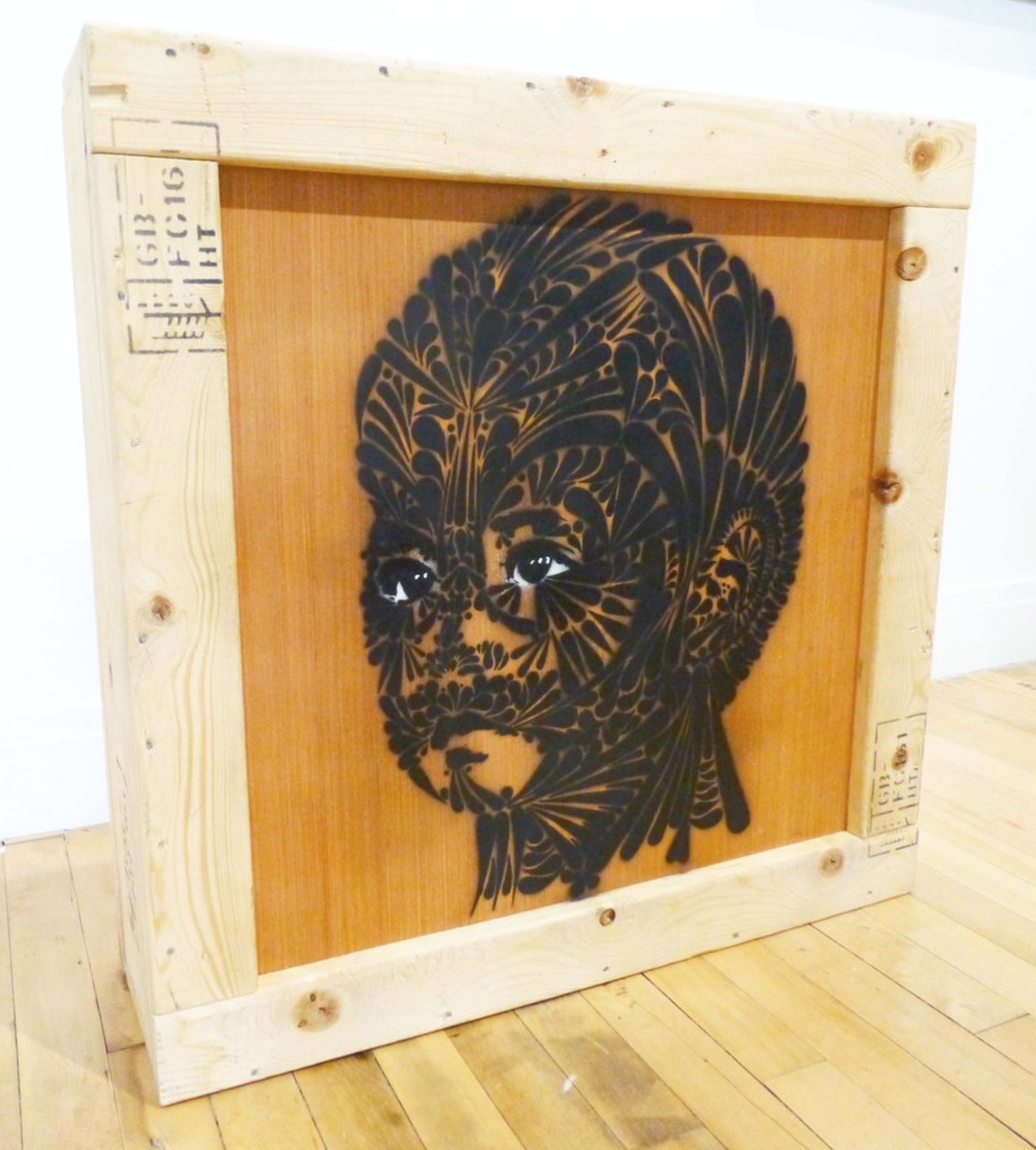 "L.A. Spine Kid," 2019. Spraypaint on wooden crate. 26 1/2 x 26 1/2 x 8 in.